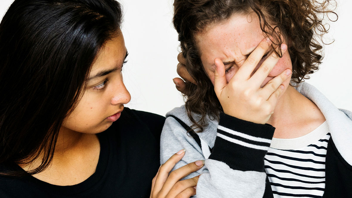 Woman comforting upset woman who realizes she canu2019t afford her miracle baby and asks half-brother to adopt it