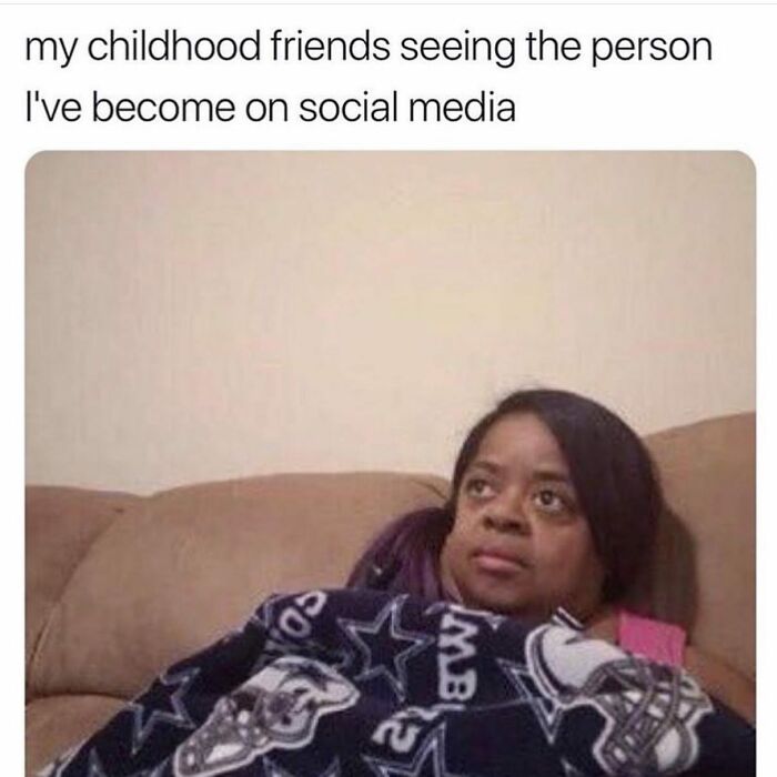 Woman wrapped in a blanket looking unimpressed, illustrating girly memes about friendships and relatable social media moments.