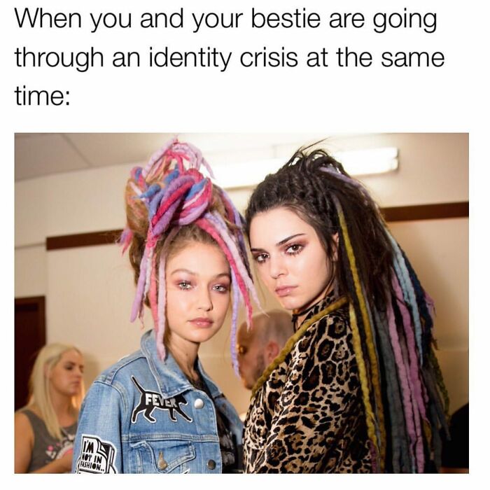 Two women with colorful dreadlocks showing relatable girly friendship meme about identity crisis and work struggles.