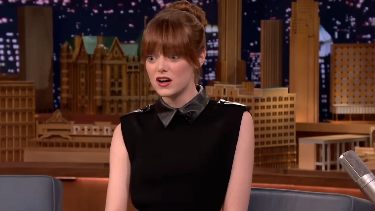 Actress reacting with surprise during a late-night talk show interview about bizarre things found inside strangersu2019 houses.