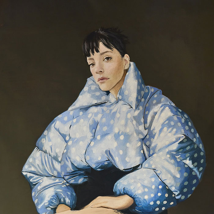 Portrait of Lily Allen wearing a blue polka dot jacket, related to Lily Allen brutal album about David Harbour discussion. Portrait of Lily Allen wearing a blue polka dot jacket, related to Lily Allen brutal album about David Harbour discussion.