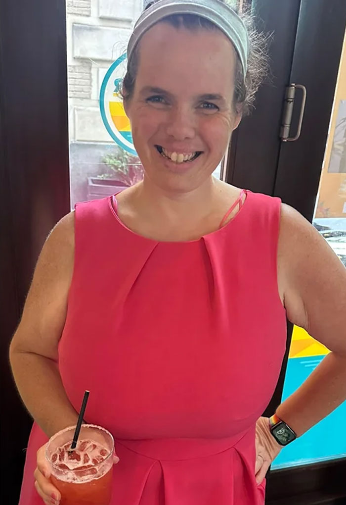 Woman in a pink dress smiling indoors, sharing her weight loss journey with Costco helping her lose 130 lbs. Woman in a pink dress smiling indoors, sharing her weight loss journey with Costco helping her lose 130 lbs.