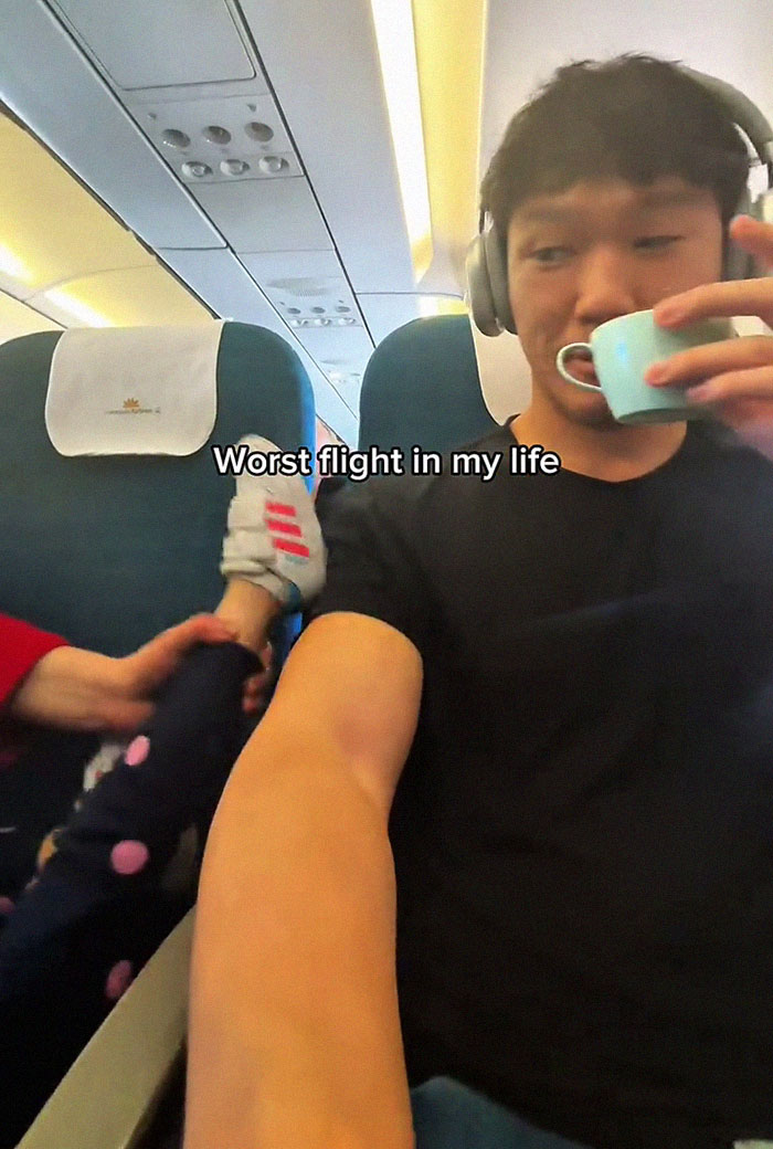 Frequent traveler experiences worst flight as a child kicks him on an airplane while he drinks from a small cup. Frequent traveler experiences worst flight as a child kicks him on an airplane while he drinks from a small cup.
