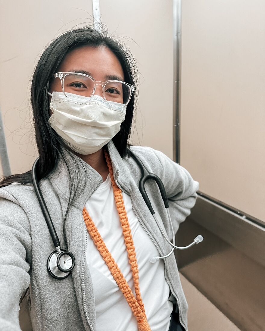 Young Asian woman wearing mask and stethoscope, challenging Asian stereotypes in the modern world with confidence.
