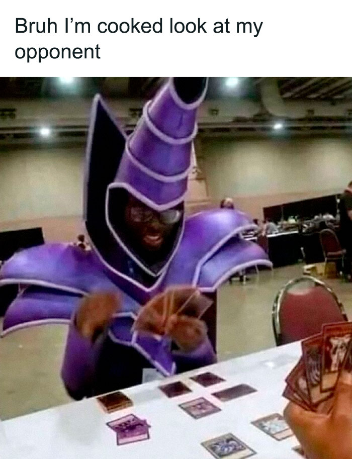 Person dressed in a detailed purple costume playing a card game, one of the pics that go hard and popular among people.