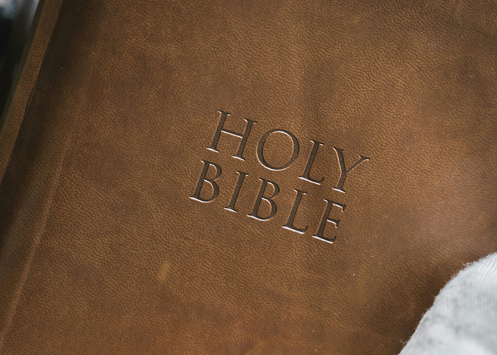 Close-up of a brown leather Holy Bible cover, representing horrible gifts people have actually received.