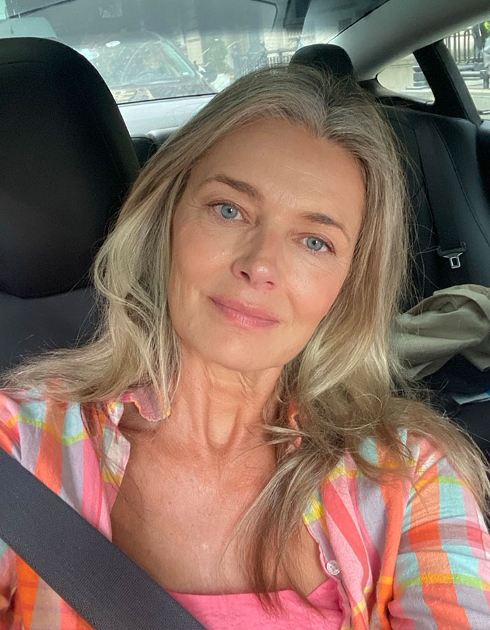 Paulina Porizkova at 60, embracing natural beauty and perfect imperfections in a casual selfie inside a car.