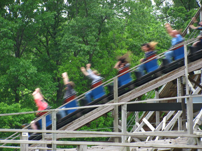 Couple saving terrified girl on roller coaster with 205-foot drop after her seat belt pops open during the ride.