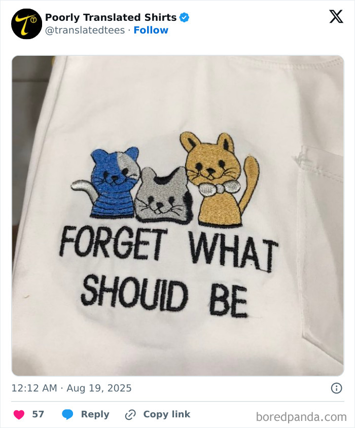 White T-shirt with three embroidered cats and funny English text showing a ridiculous translation fail.
