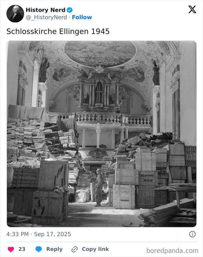 Interior of Schlosskirche Ellingen in 1945, showing a soldier amid stacks of crates and historical artifacts exploring history.