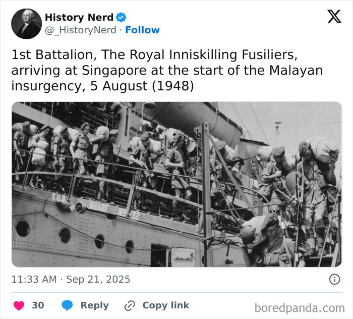 Historic black and white photo of soldiers arriving by ship, exploring history through rare and powerful moments from our past.