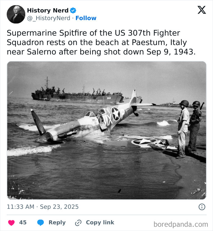 World War II Supermarine Spitfire plane shot down on Italian beach with soldiers nearby exploring history.