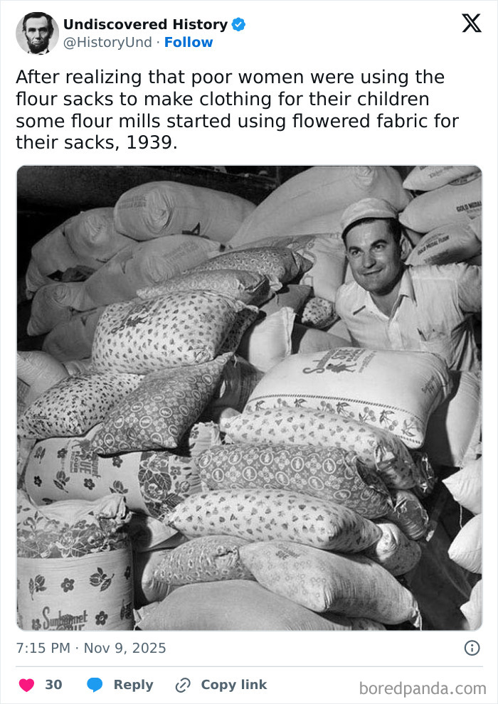 Black and white photo of a man surrounded by flowered fabric flour sacks from 1939 revealing moments lost to time.