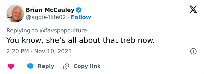 Screenshot of a Twitter reply joking about Meghan Trainor's new look, mentioning bass and treb in a fan reaction. Screenshot of a Twitter reply joking about Meghan Trainor's new look, mentioning bass and treb in a fan reaction.