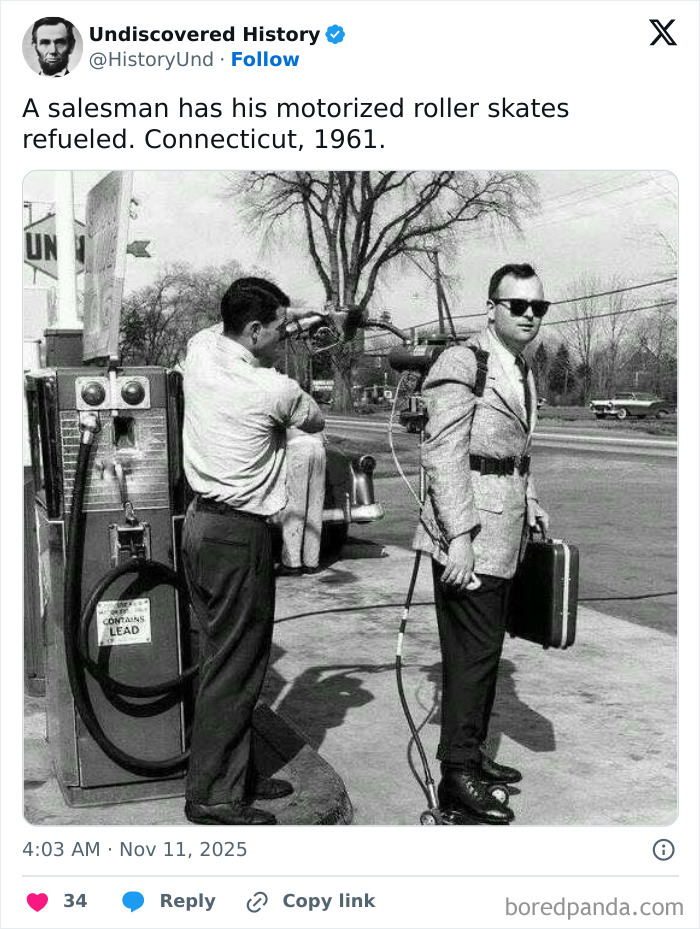 Black and white photo showing a man refueling motorized roller skates at a gas station, revealing moments lost to time.