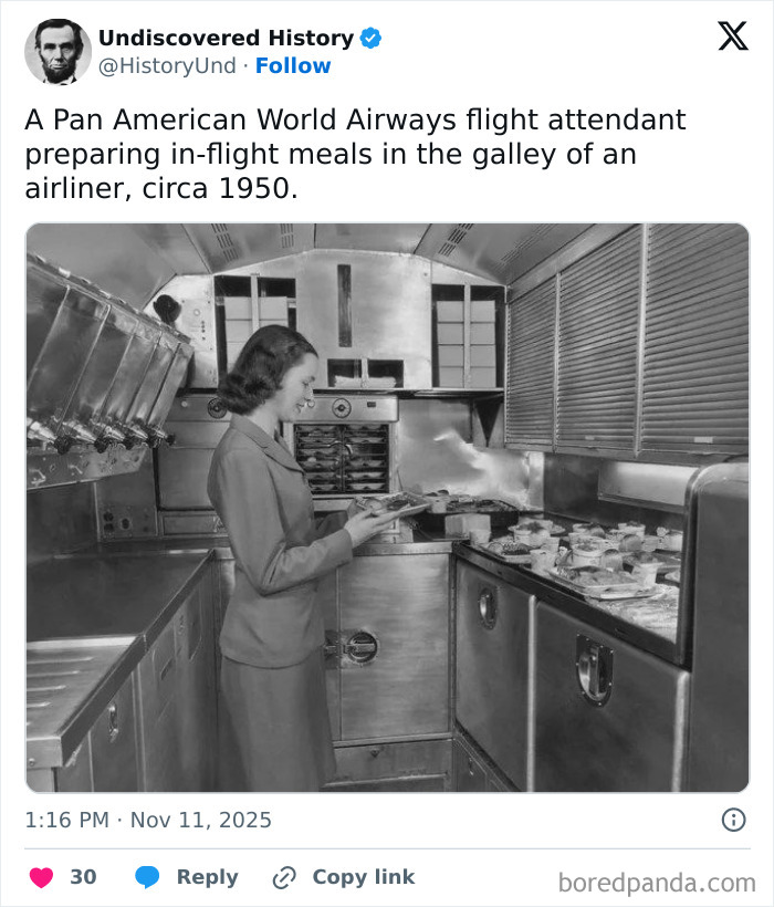 Pan American flight attendant preparing in-flight meals in a 1950s galley, a fascinating moment lost to time.