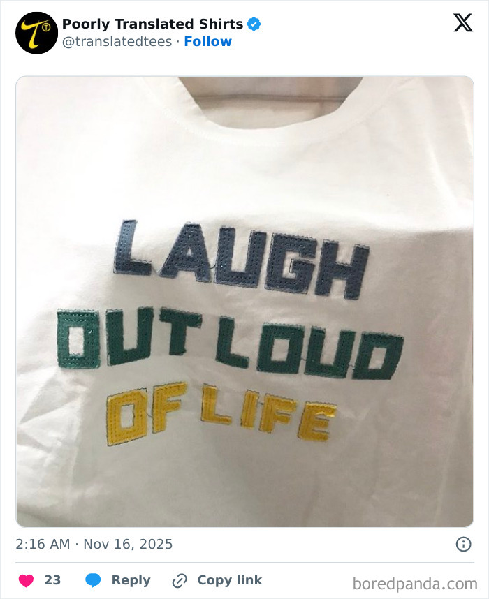 White T-shirt with a funny and poorly translated phrase embroidered as laugh out loud of life across the front.