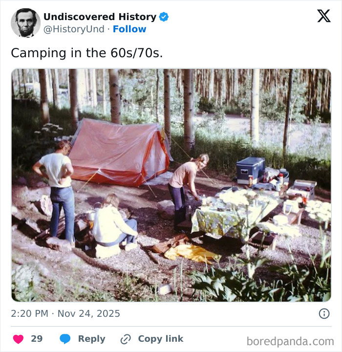 People camping in the 60s or 70s setting up a tent and picnic table in a forest, revealing moments lost to time.