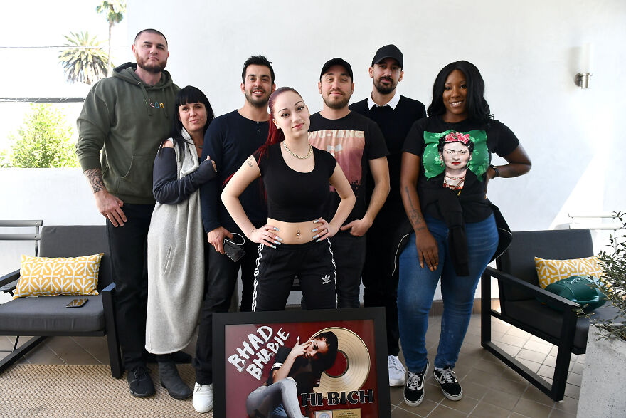 Bhad Bhabie posing with her team indoors, highlighting Bhad Bhabie net worth success in pop culture achievement. Bhad Bhabie posing with her team indoors, highlighting Bhad Bhabie net worth success in pop culture achievement.