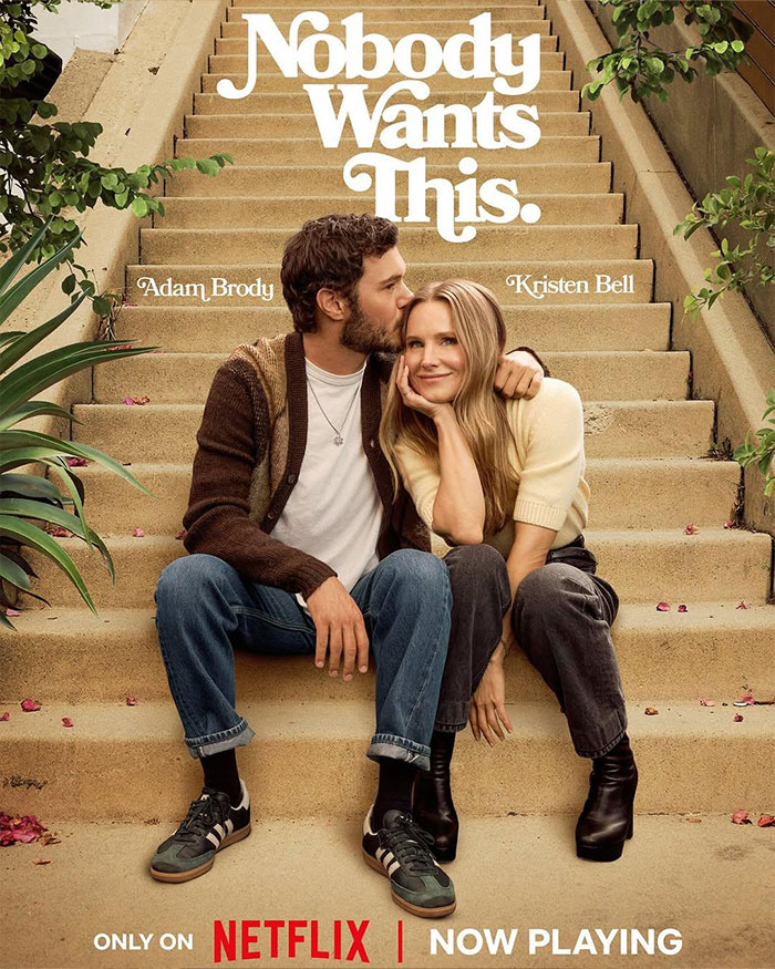 Couple sitting on outdoor steps with Kristen Bell, highlighting outrage after joining Fox Faith Project in media news. Couple sitting on outdoor steps with Kristen Bell, highlighting outrage after joining Fox Faith Project in media news.