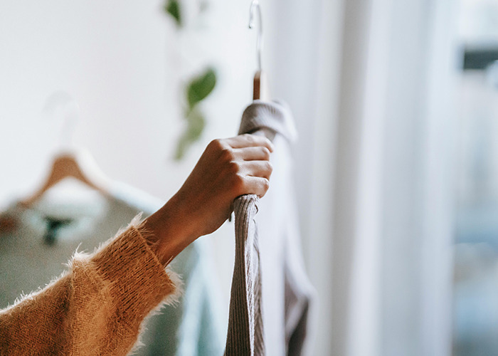 Person holding an unwanted gift, highlighting the theme of horrible gifts actually received by 91 people.