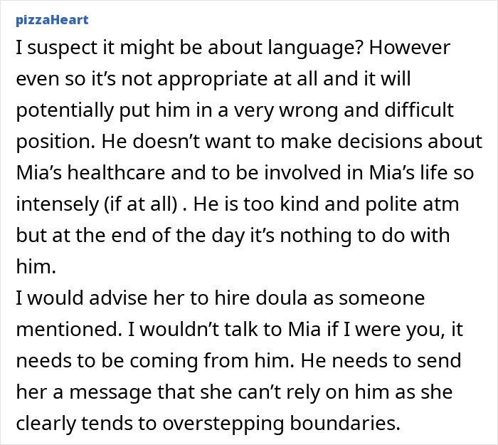 Woman looking hurt while her partner supports birth without her, expressing feelings of exclusion and emotional pain.