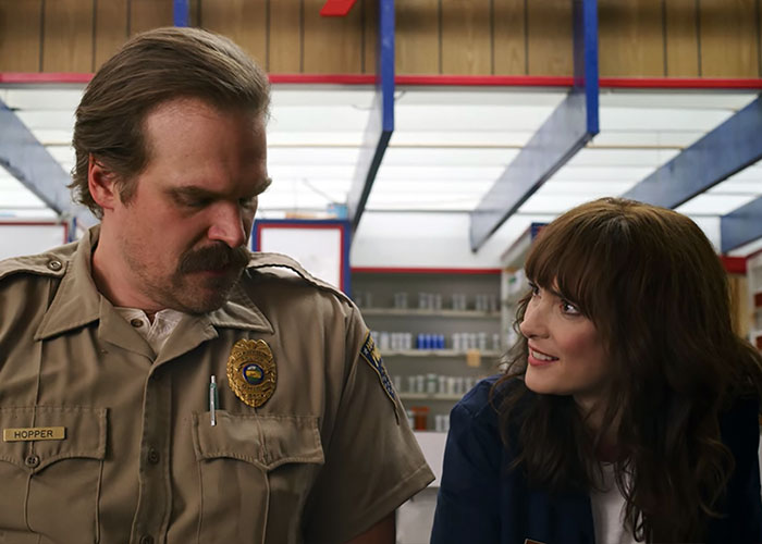 David Harbour and Stranger Things co-star in a scene, showcasing their on-screen chemistry and connection. David Harbour and Stranger Things co-star in a scene, showcasing their on-screen chemistry and connection.