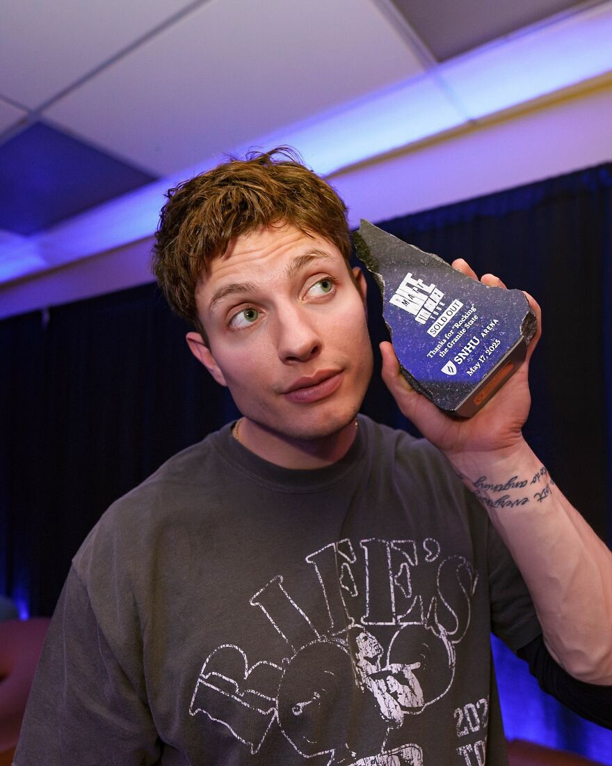 Matt Rife holding a sold out Big Tours award backstage, highlighting his rising net worth and successful comedy career. Matt Rife holding a sold out Big Tours award backstage, highlighting his rising net worth and successful comedy career.