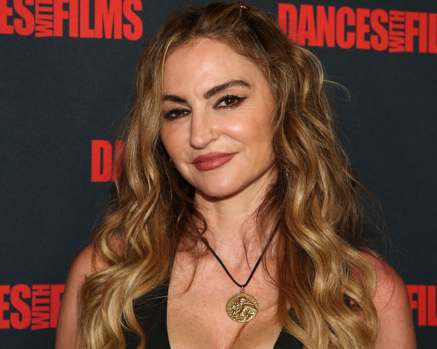 Drea De Matteo with long wavy hair at a Dances With Films event, related to members-only fan pages.
