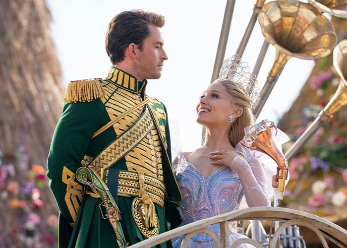 Ariana Grande and Jonathan Bailey in an intimate scene, sparking home wrecking jokes among fans. Ariana Grande and Jonathan Bailey in an intimate scene, sparking home wrecking jokes among fans.