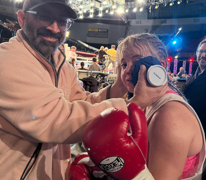 A man tends to a female boxer wearing red gloves ringside, illustrating leaked PR emails about Sydney Sweeney reps damage control. A man tends to a female boxer wearing red gloves ringside, illustrating leaked PR emails about Sydney Sweeney reps damage control.