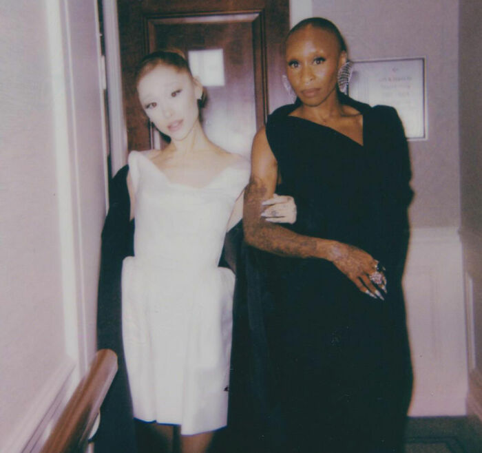 Cynthia Erivo and Ariana Grande posing together at an event, highlighting their new bizarre interaction. Cynthia Erivo and Ariana Grande posing together at an event, highlighting their new bizarre interaction.