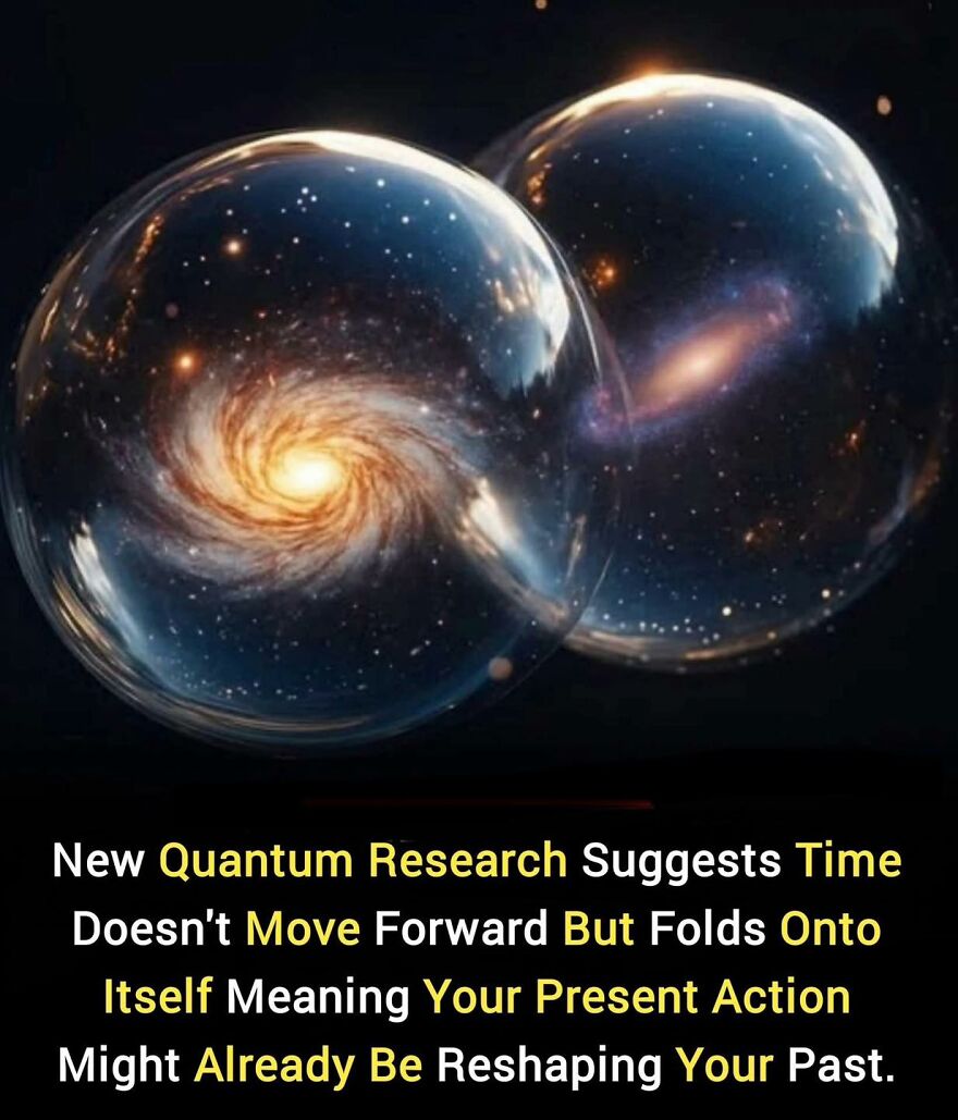 Two glowing orbs showing galaxies illustrate quantum research about time folding and reshaping past actions.