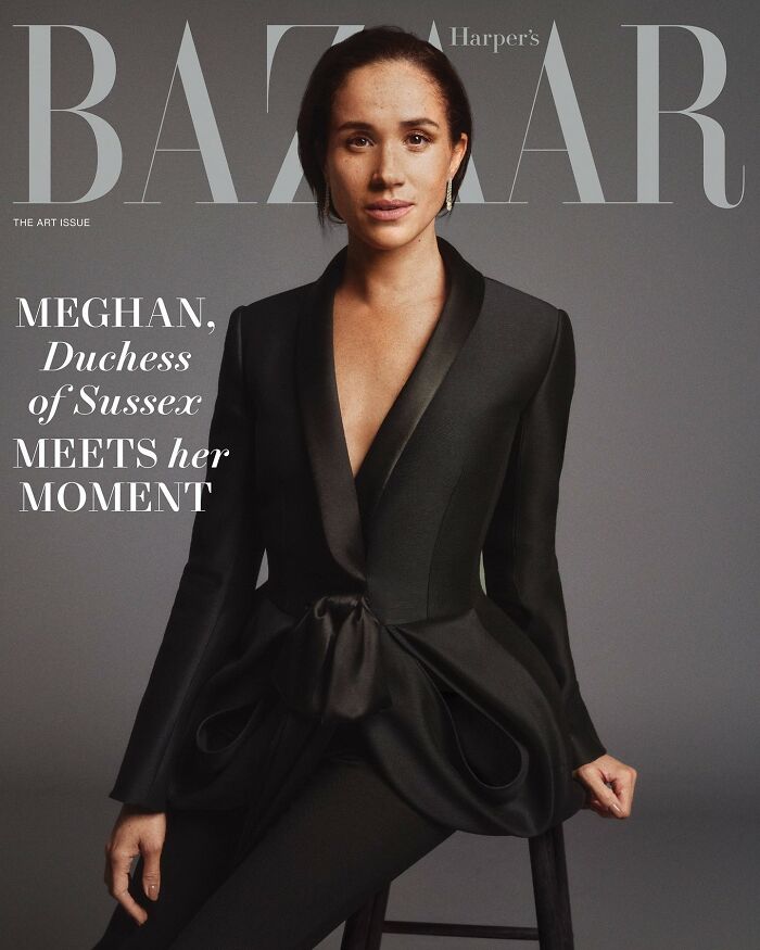 Meghan Markle posing makeup-free in a stylish black suit for a Harper's Bazaar cover photo shoot. Meghan Markle posing makeup-free in a stylish black suit for a Harper's Bazaar cover photo shoot.