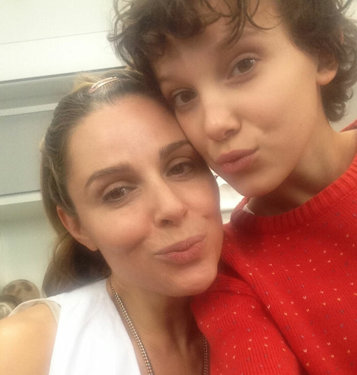 Stranger Things star Millie Bobby Brown with a woman, close-up selfie highlighting bullying issues faced by the actress. Stranger Things star Millie Bobby Brown with a woman, close-up selfie highlighting bullying issues faced by the actress.