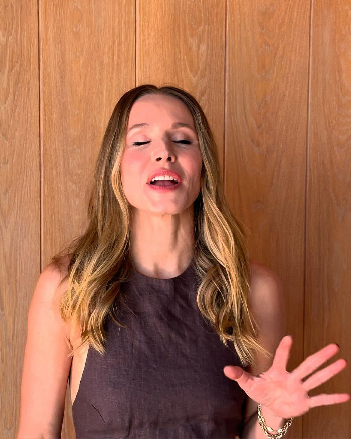 Kristen Bell speaking with eyes closed and hand raised, sparking outrage over Fox Faith Project involvement.