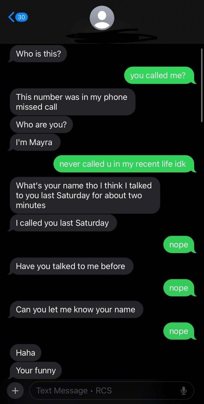 Screenshot of a funny wrong number text exchange with repeated denials and confusion in dark mode chat.