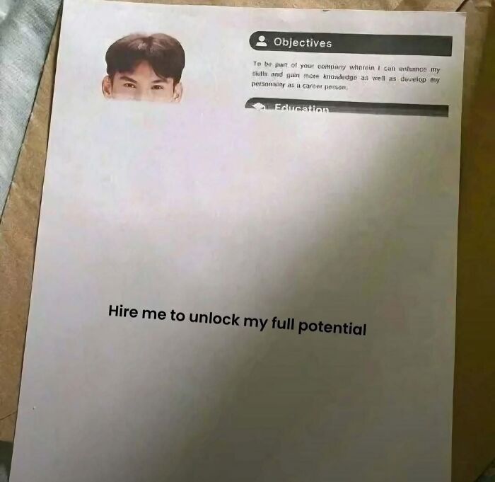 A humorous meme showing a partial resume with a photo and the text hire me to unlock my full potential.