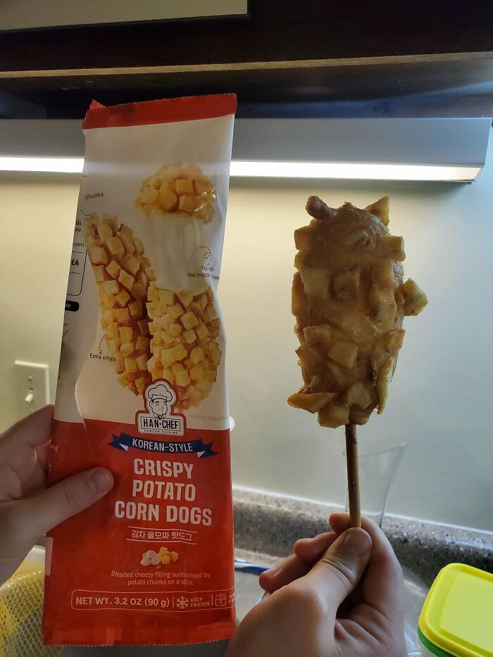 Misleading packaging showing crispy potato corn dog image versus smaller, uneven product held side by side.
