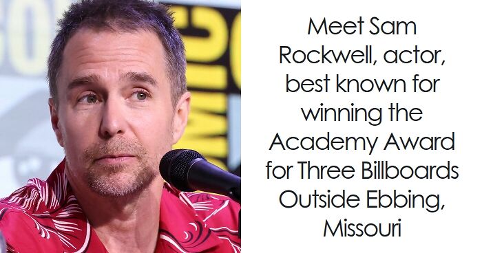 Sam Rockwell speaking into a microphone at an event, known for his acclaimed acting career and awards.