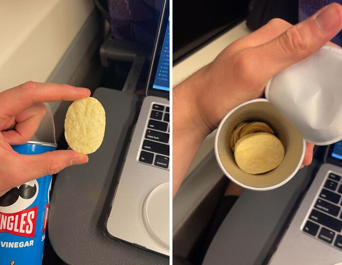 Hand holding a single Pringles chip next to a nearly empty can showing misleading packaging and product amount.