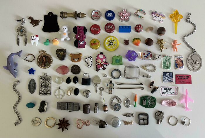Various small objects neatly arranged in a grid, illustrating all things knolled for order and satisfaction.
