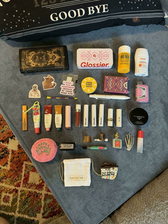 Neatly arranged collection of personal care and cosmetic items showcasing satisfaction in order and organization.