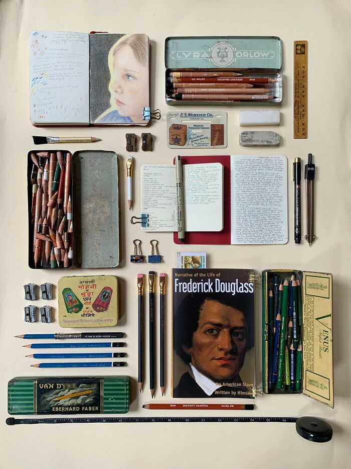 Neatly arranged drawing pencils, notebooks, sketching tools, and a book, exemplifying all things knolled for order.