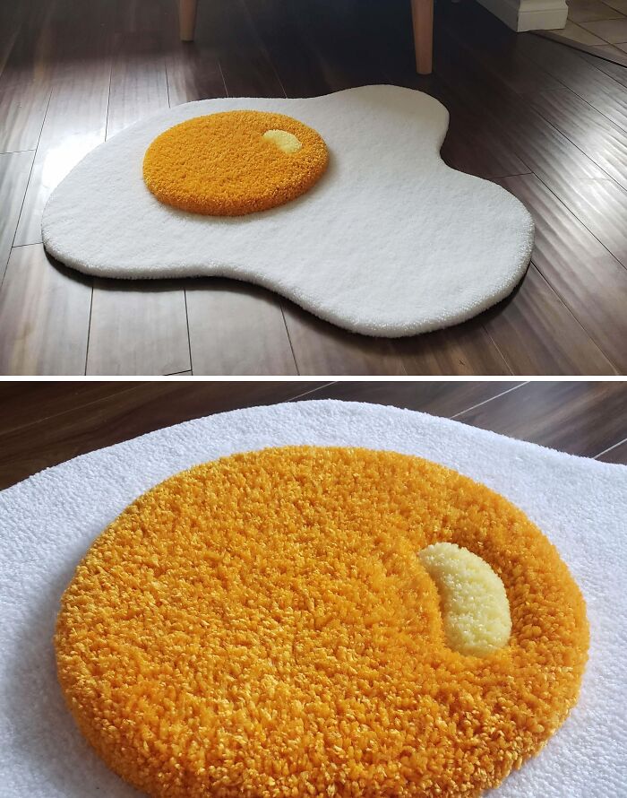 Rug shaped like a fried egg on wooden floor, showcasing creative people and their cool projects in home decor.