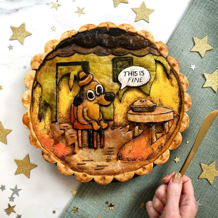 Pie decorated with a creative fiery dog scene and speech bubble, showcasing cool projects by creative people that inspire and amaze.