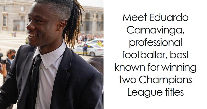 Eduardo Camavinga smiling in a suit outdoors, professional footballer known for winning Champions League titles.