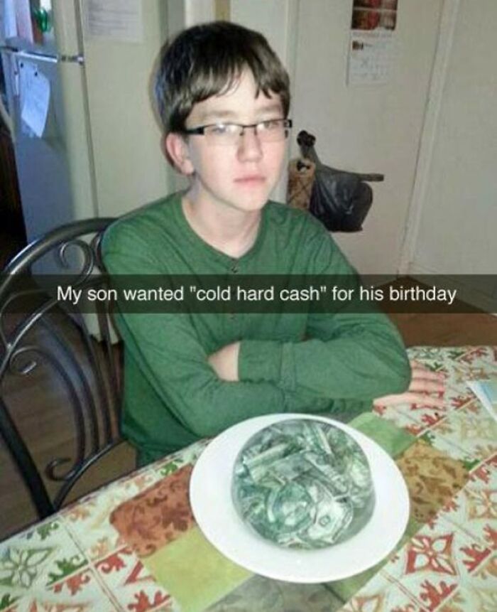 Teen boy wearing glasses sitting at a table with a bowl of frozen dollar bills showing unhinged pics of people doing exactly what they were asked to do.