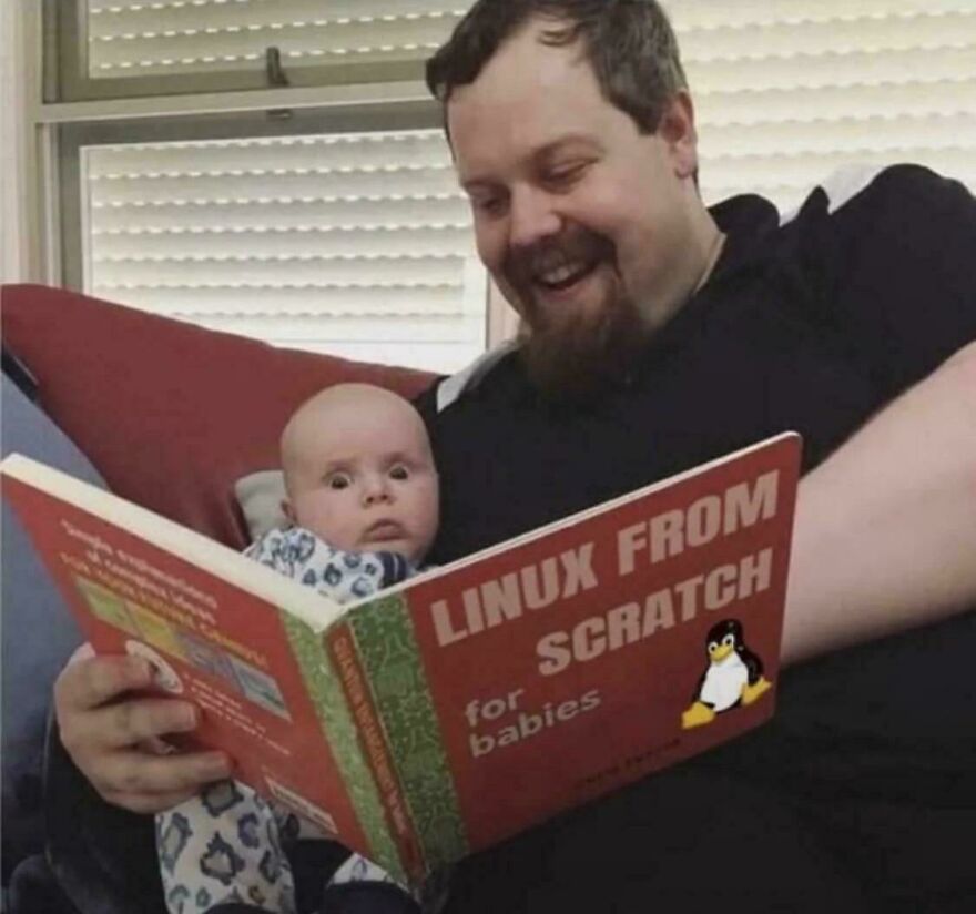 Man and baby reading a Linux book together, humorously highlighting programming and debugging as a universal struggle.