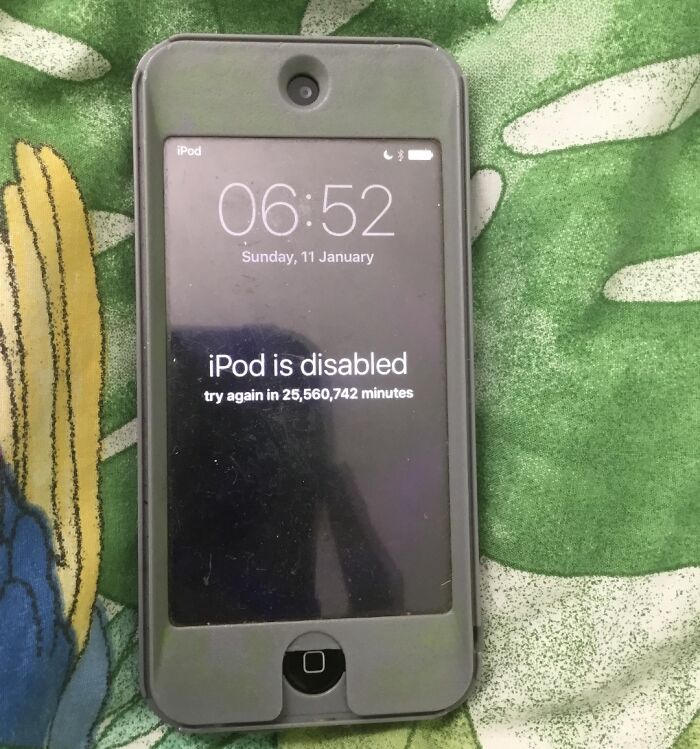 iPod disabled showing extreme lockout time, highlighting frustration with family members causing device issues online.